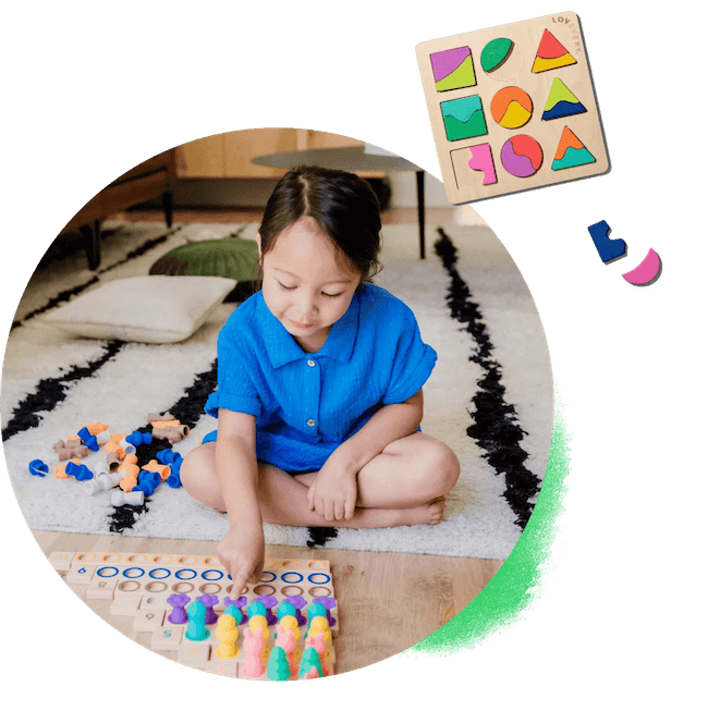 3-year old playing with toys from The Play Kits by Lovevery